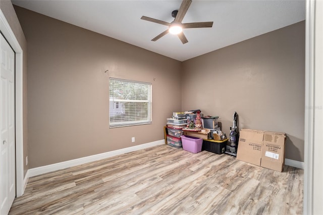 office area with wood-type flooring and ceiling fan