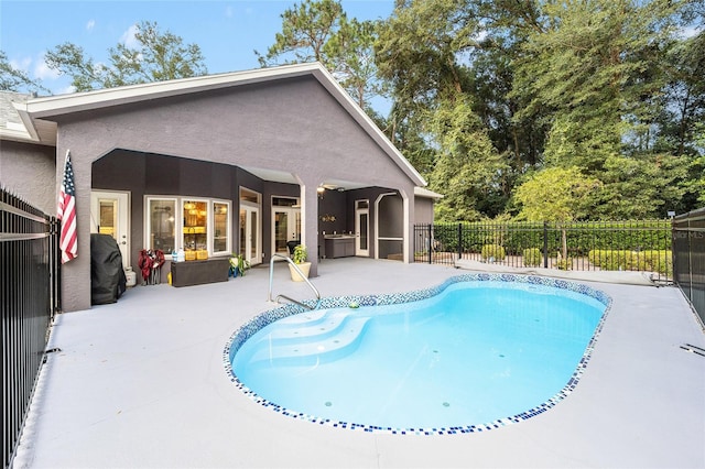 view of pool featuring a patio area