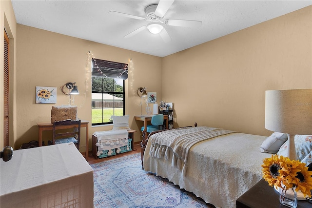 bedroom featuring a closet, ceiling fan, and hardwood / wood-style flooring