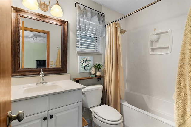 full bathroom featuring ceiling fan, vanity, shower / tub combo, and toilet