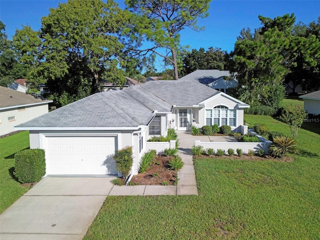 ranch-style house featuring a garage, stucco siding, concrete driveway, and a front lawn