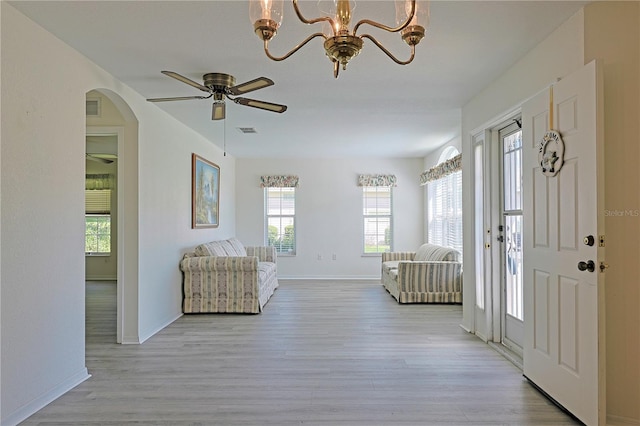 entrance foyer with light wood-type flooring and ceiling fan