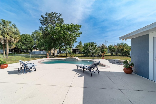 view of patio featuring a fenced in pool