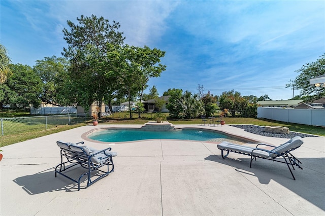 view of swimming pool featuring a patio area