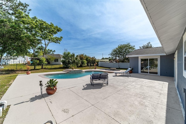 view of pool featuring a yard and a patio