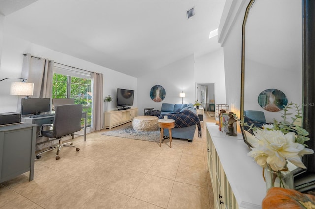 tiled living room featuring vaulted ceiling