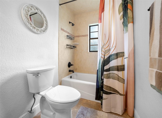 bathroom with toilet and shower / bath combo with shower curtain