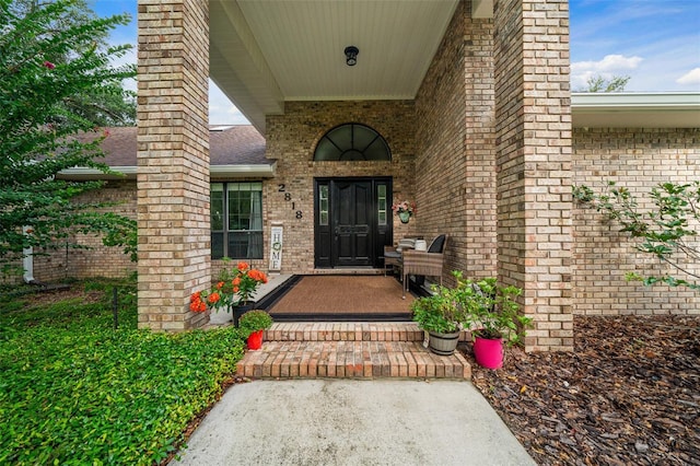 doorway to property featuring a porch