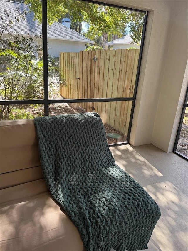 sunroom / solarium featuring plenty of natural light