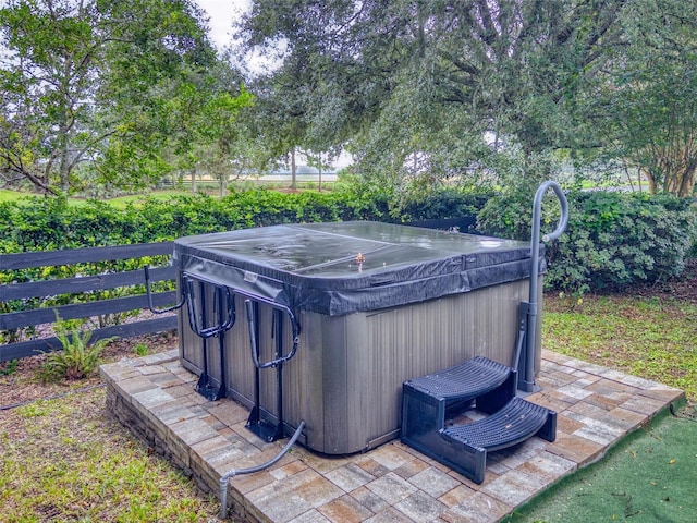 view of patio with a hot tub