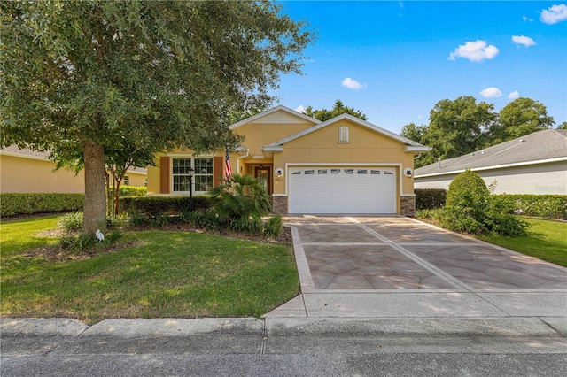 single story home featuring stone siding, a front yard, an attached garage, and stucco siding