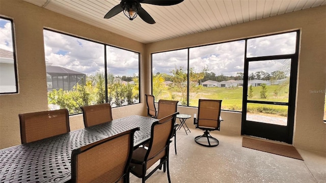 sunroom / solarium with ceiling fan