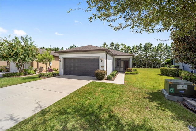 view of front facade featuring a front yard and a garage