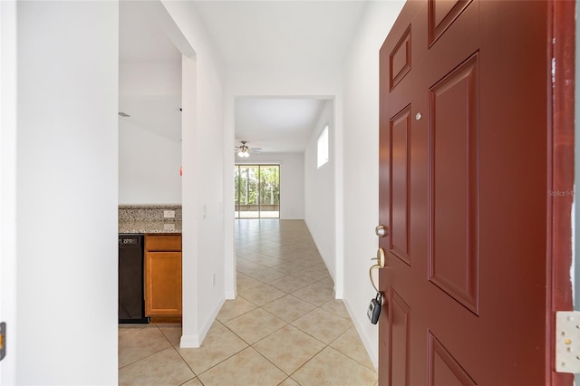 hallway with light tile patterned flooring