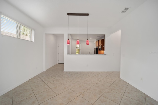 interior space with light tile patterned flooring