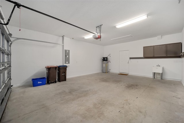 garage with electric panel, a garage door opener, and hybrid water heater