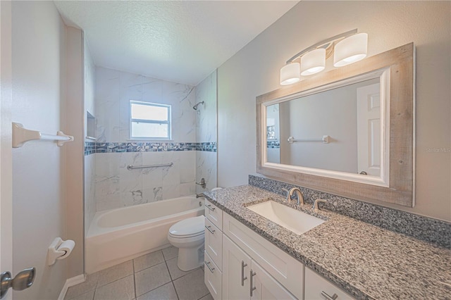 full bathroom with a textured ceiling, vanity, toilet, tile patterned floors, and tiled shower / bath combo