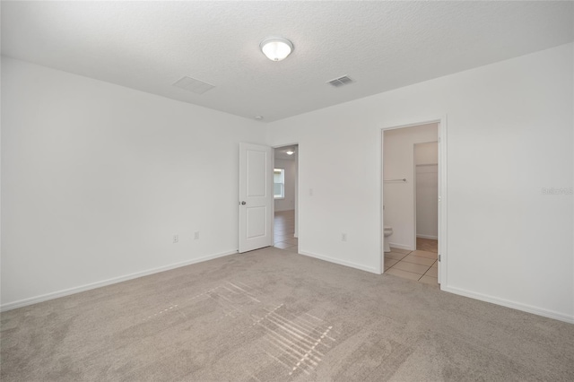 interior space featuring a textured ceiling