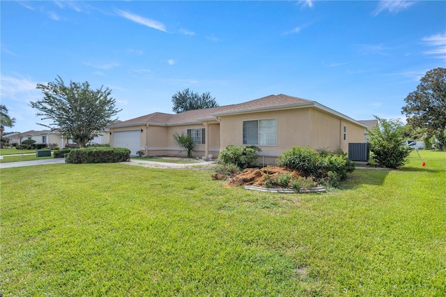 ranch-style house featuring cooling unit, a front yard, and a garage