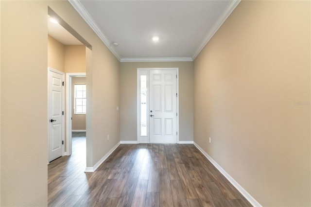 entrance foyer featuring baseboards, dark wood finished floors, and crown molding