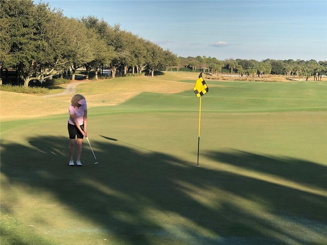 view of home's community featuring golf course view