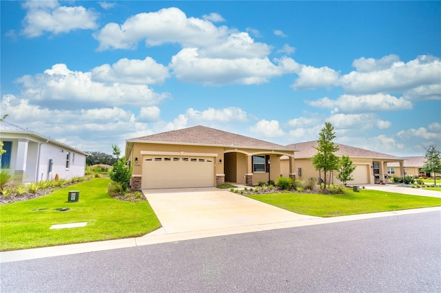 9994 SW 96th St, Ocala, FL 34481 - ranch-style house with an attached garage, concrete driveway, stucco siding, and a front lawn
