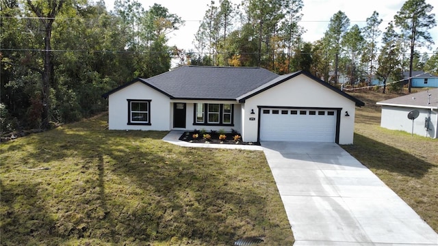 ranch-style home featuring a front yard and a garage