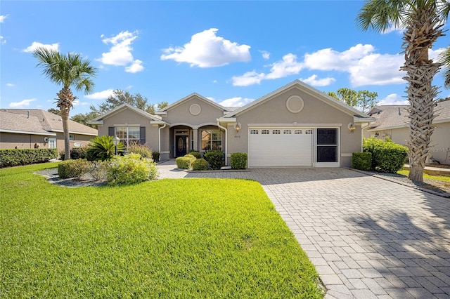 ranch-style home with a front lawn and a garage