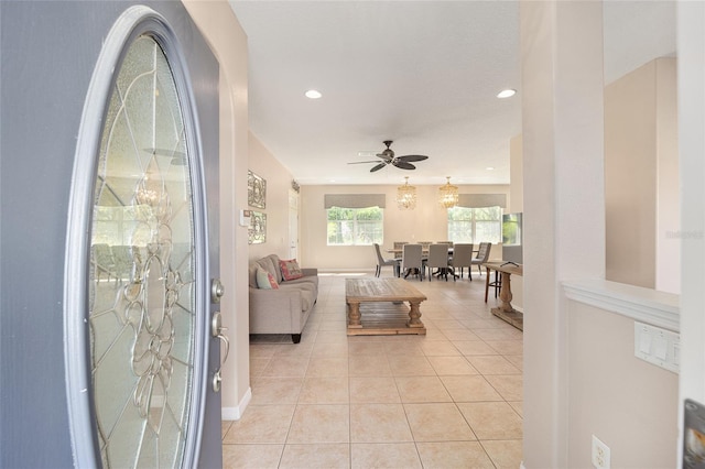 living room with ceiling fan, light tile patterned flooring, and recessed lighting