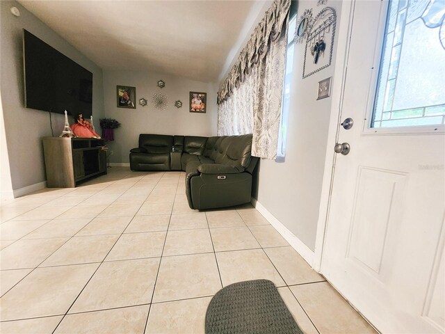 living room featuring light tile patterned floors