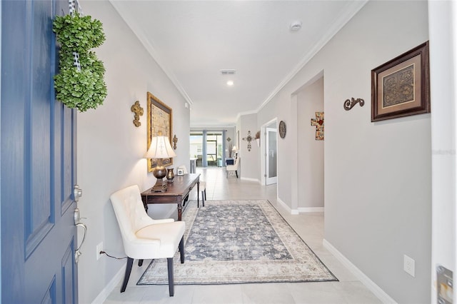 corridor with baseboards, light tile patterned flooring, and crown molding