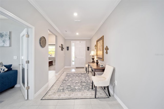 entryway with light tile patterned floors, recessed lighting, baseboards, and crown molding