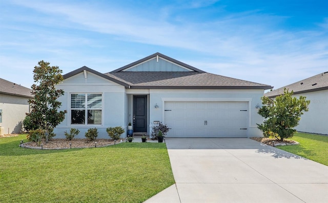 single story home featuring a garage and a front lawn