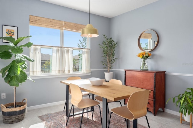 view of tiled dining space