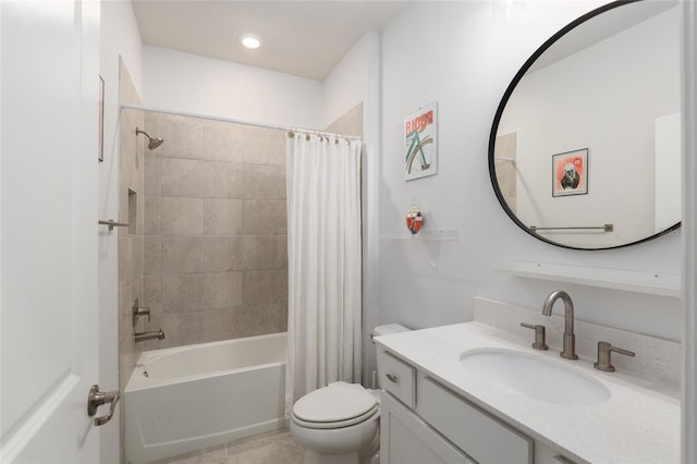 full bathroom with vanity, shower / bath combination with curtain, and toilet