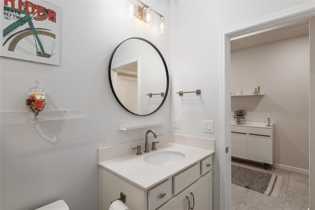 bathroom featuring vanity and tile patterned flooring