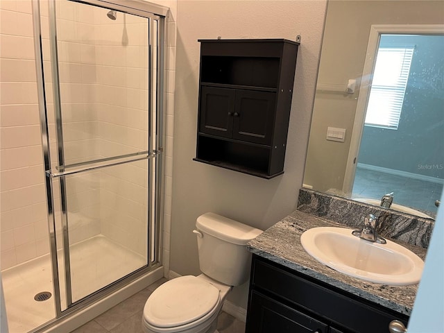 bathroom featuring an enclosed shower, tile patterned floors, toilet, and vanity