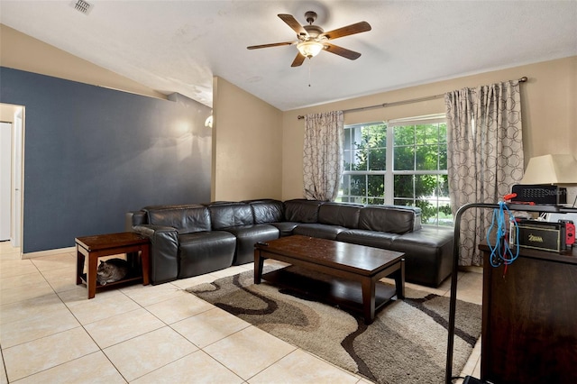 living room with visible vents, vaulted ceiling, a ceiling fan, and tile patterned floors