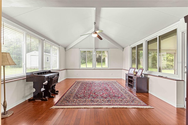 office area with lofted ceiling, wood-type flooring, and ceiling fan