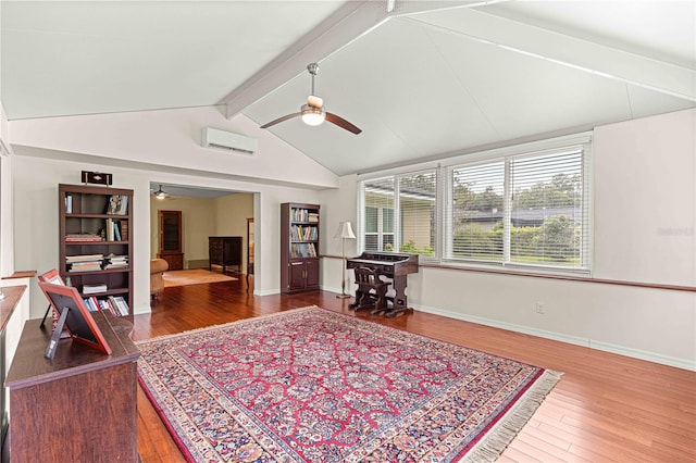 living room featuring hardwood / wood-style flooring, a wall unit AC, ceiling fan, and vaulted ceiling with beams