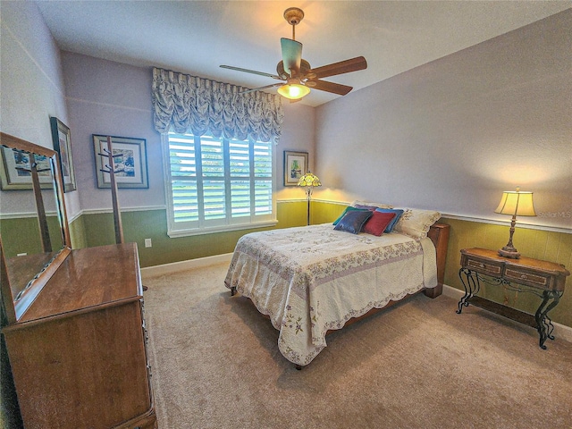 bedroom with light carpet and ceiling fan