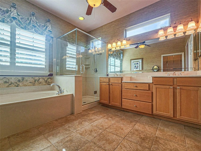 bathroom with vanity, ceiling fan, tile patterned floors, and plus walk in shower