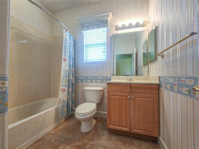 full bathroom featuring tile patterned floors, toilet, shower / tub combo with curtain, and vanity