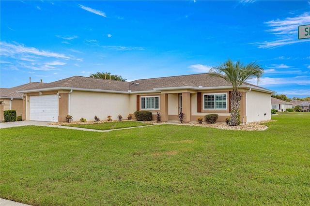 single story home featuring a garage and a front lawn