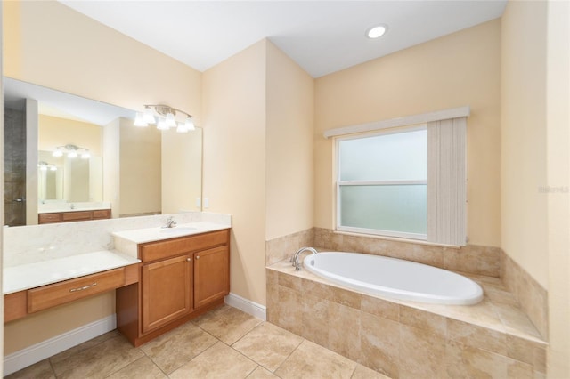 bathroom with tile patterned floors, tiled bath, and vanity