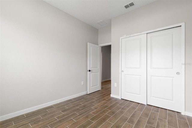 unfurnished bedroom featuring a closet