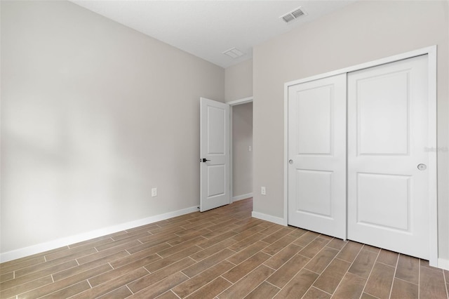 unfurnished bedroom featuring a closet