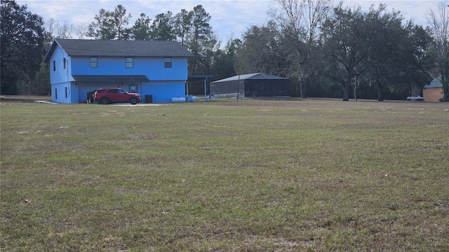 view of yard featuring a garage