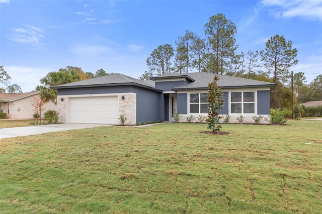 view of front facade featuring a front lawn and a garage