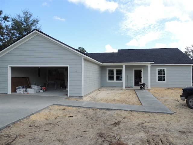 single story home featuring a garage